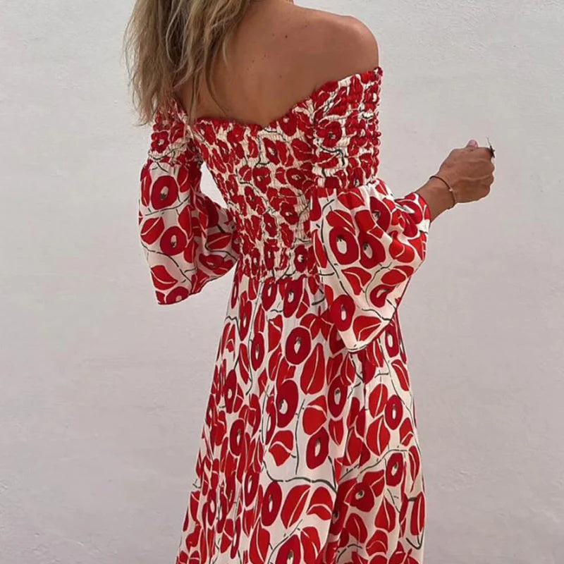 Long floral dress with off-the-shoulder sleeves and flared sleeves