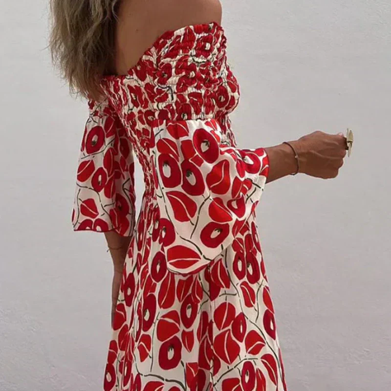 Long floral dress with off-the-shoulder sleeves and flared sleeves